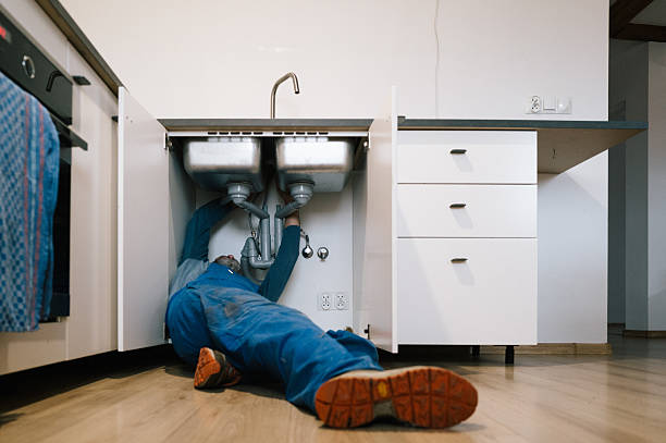 Professional Plumbing technician working in Fletcher, OH